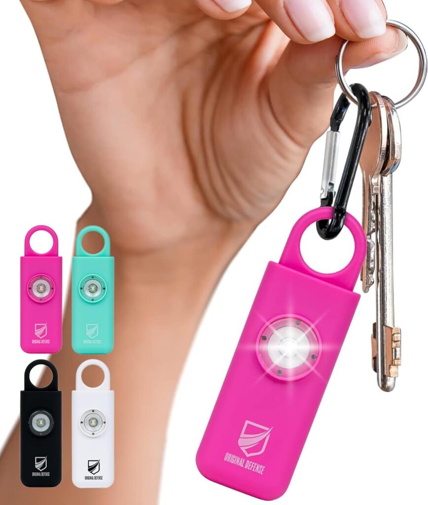 Personal safety alarm keychain with LED strobe used as a safety hack for everyday protection